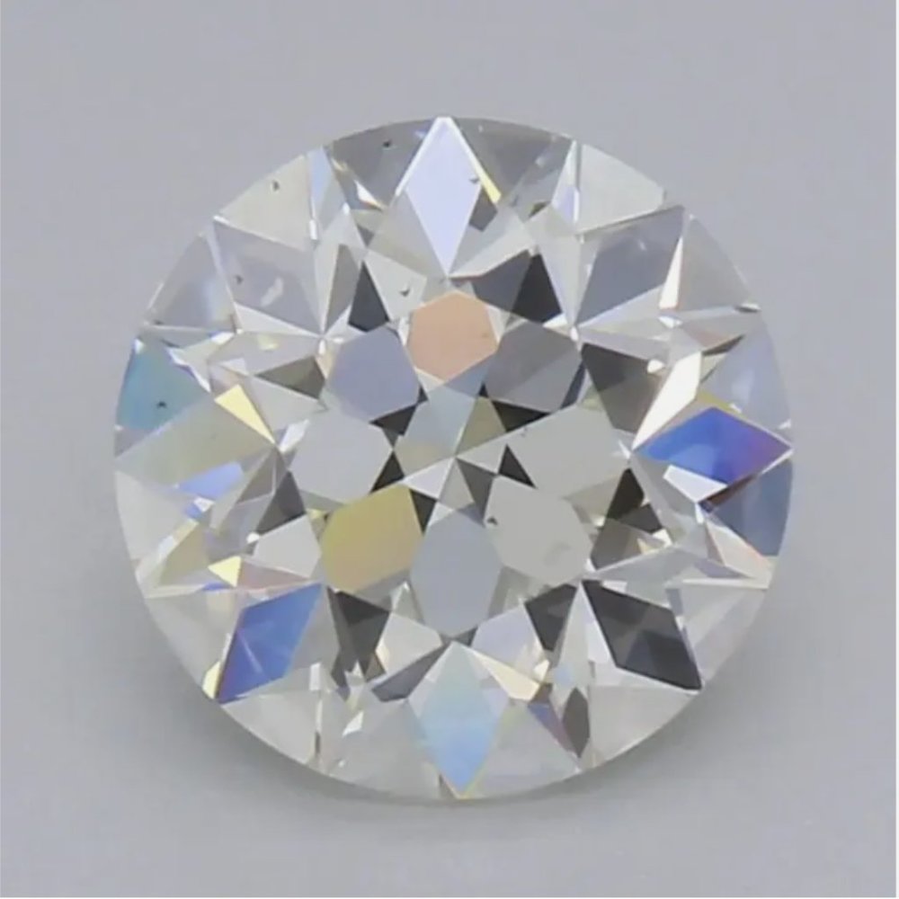 August Vintage European round moissanite earrings 14kt white gold, 2.68 t.w. 7mm